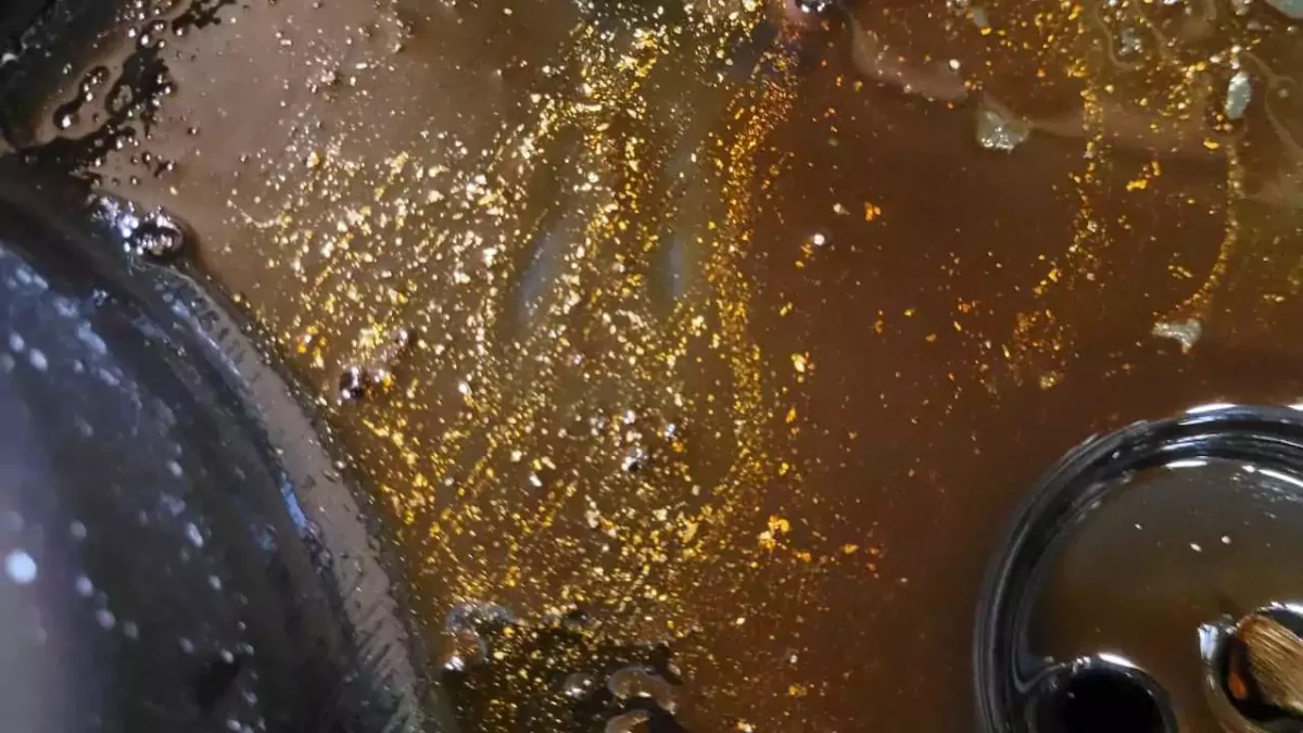 fresh oil droplet on metal