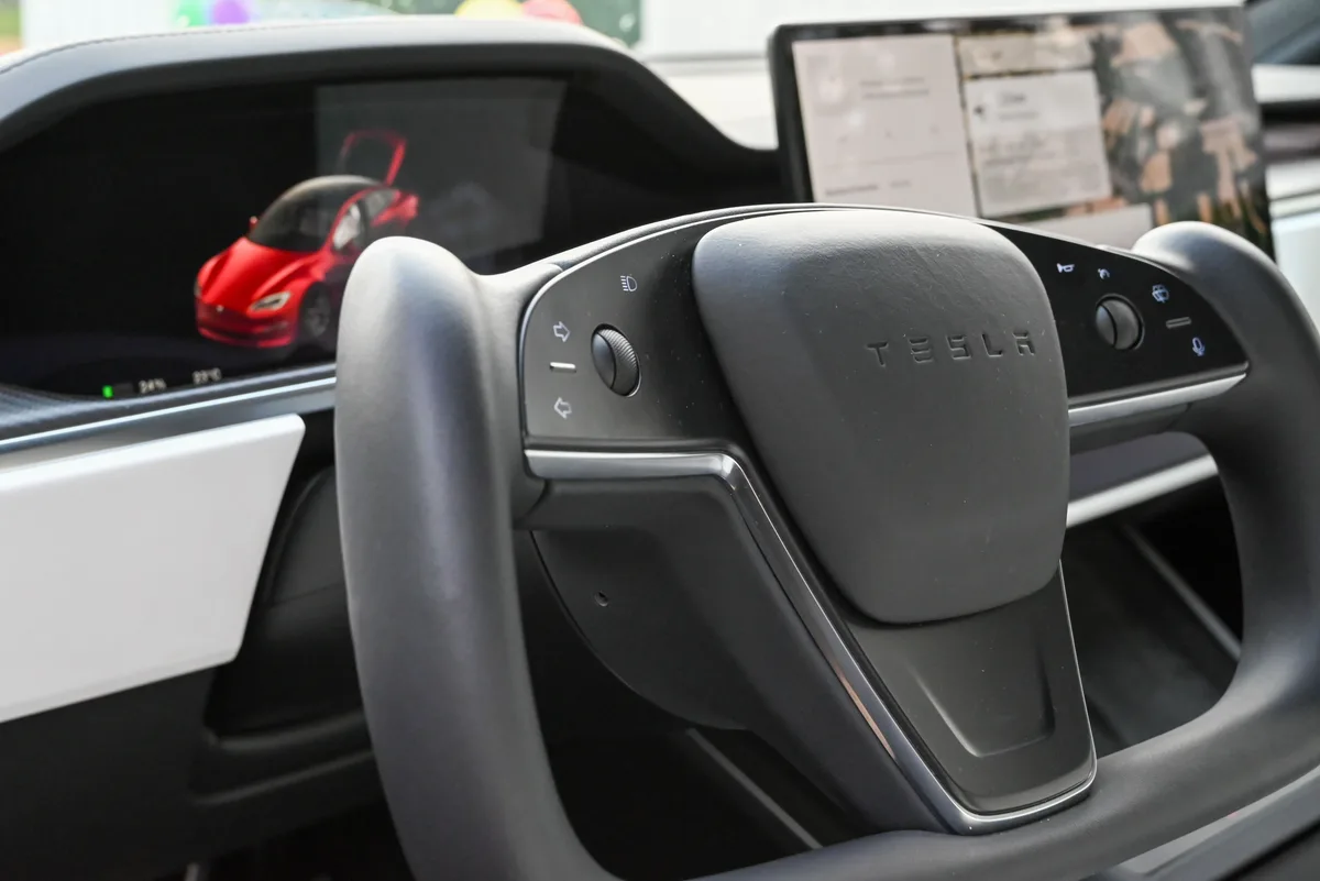 Tesla steering wheel scroll wheels